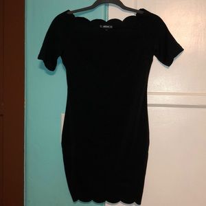 Scalloped mini dress.